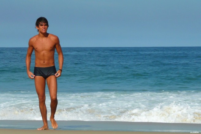 healthy lifestyle, tanned man at beach