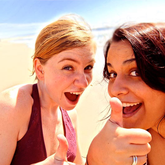 Two girls thumbs up!